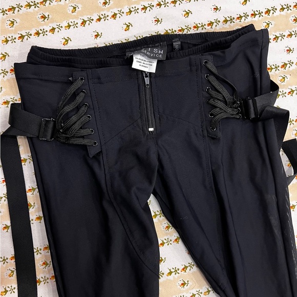 Lip Service Pants - Lip Service “Fetish” Black Mesh Lace Up Flare Zip Front with Mini Shorts